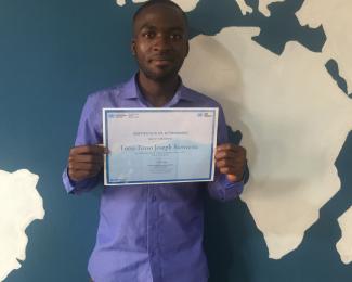 Student with his certificate